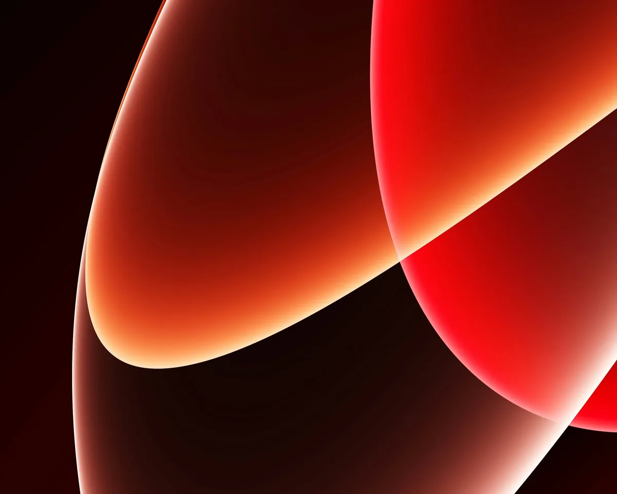 Abstract glowing red and orange curves on a dark background.